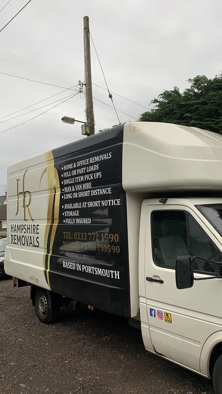 Loading a double fridge freezer into a moving van