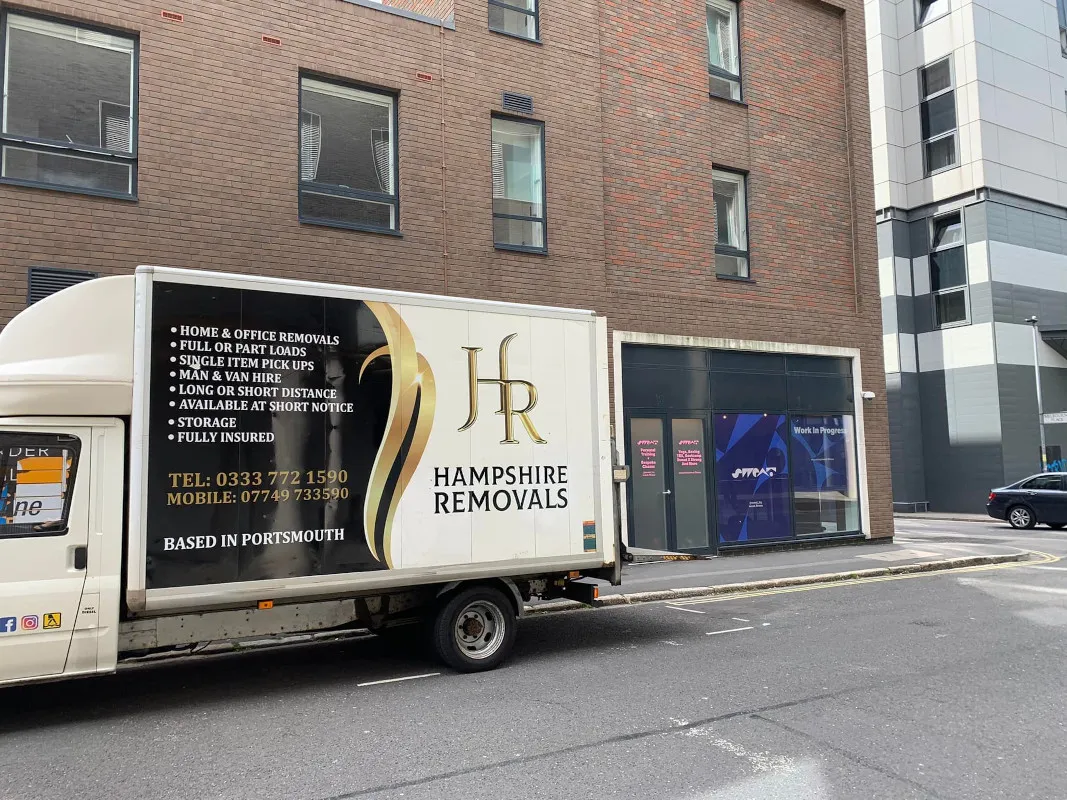 Using the tail lift to load a large cardboard box