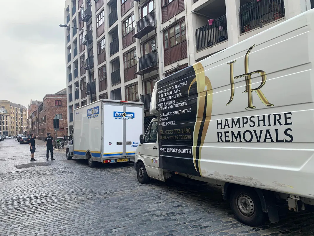 Furniture being moved down a flight of steps